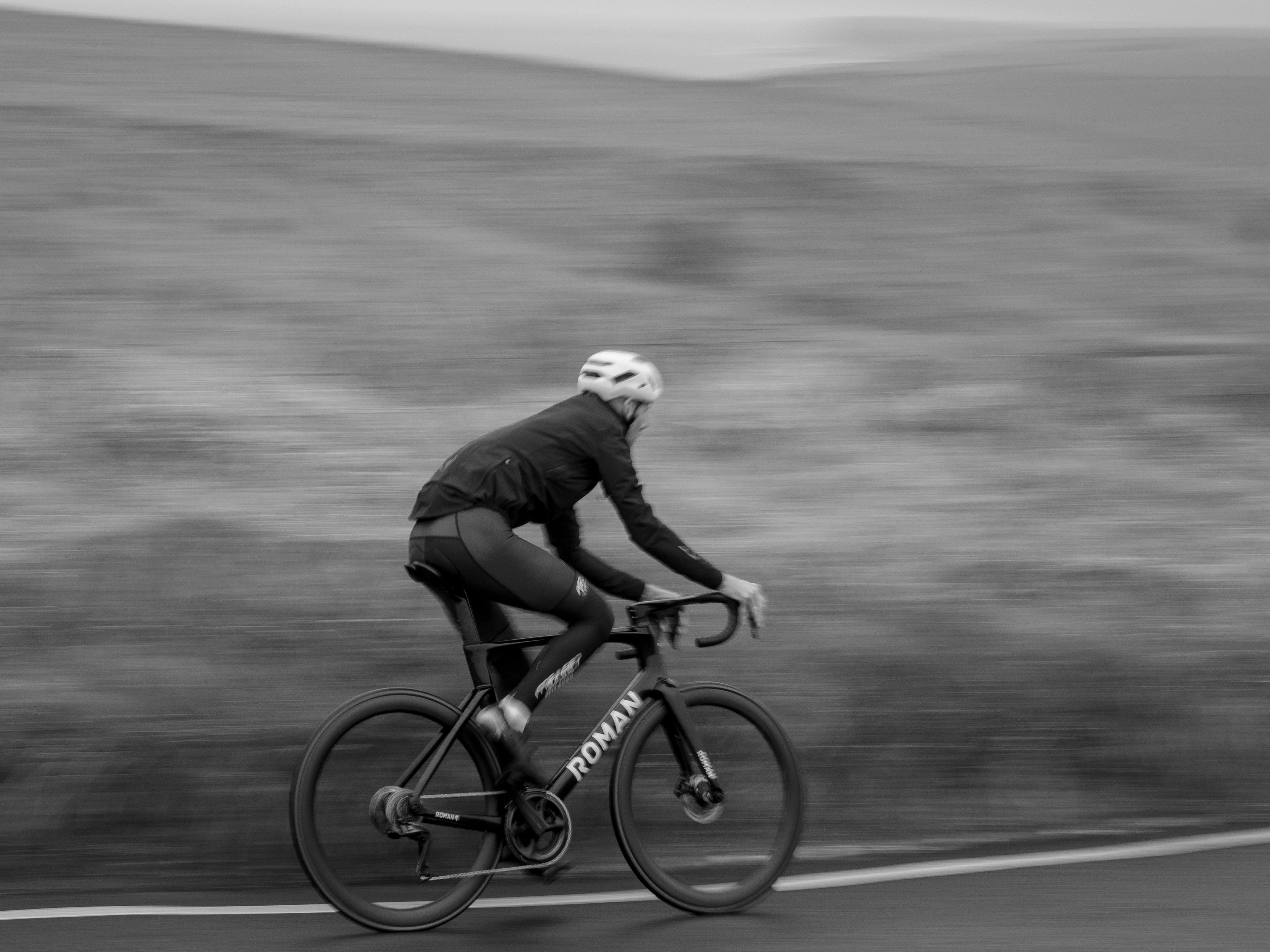 Roman Bike Riding Fast In the Rain